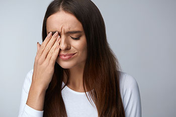 Woman in Her 20s Experiencing Eye Pain