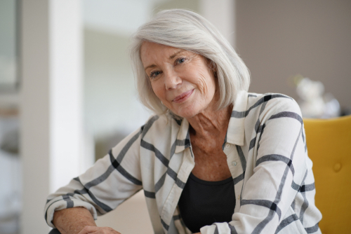 older woman smiling at camera