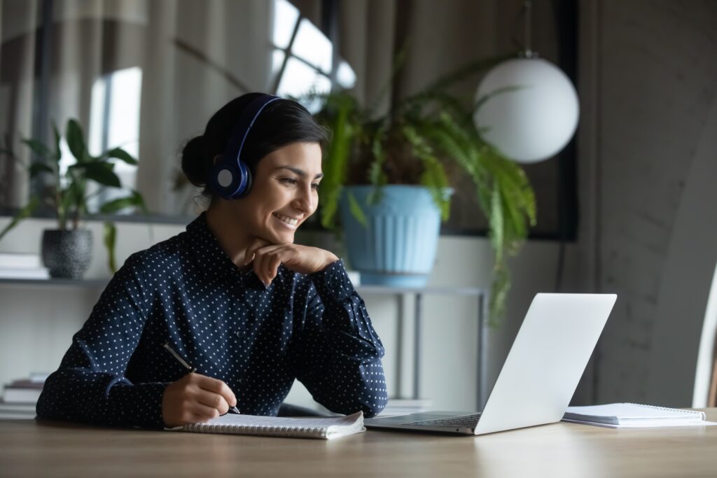 woman looking at her computer